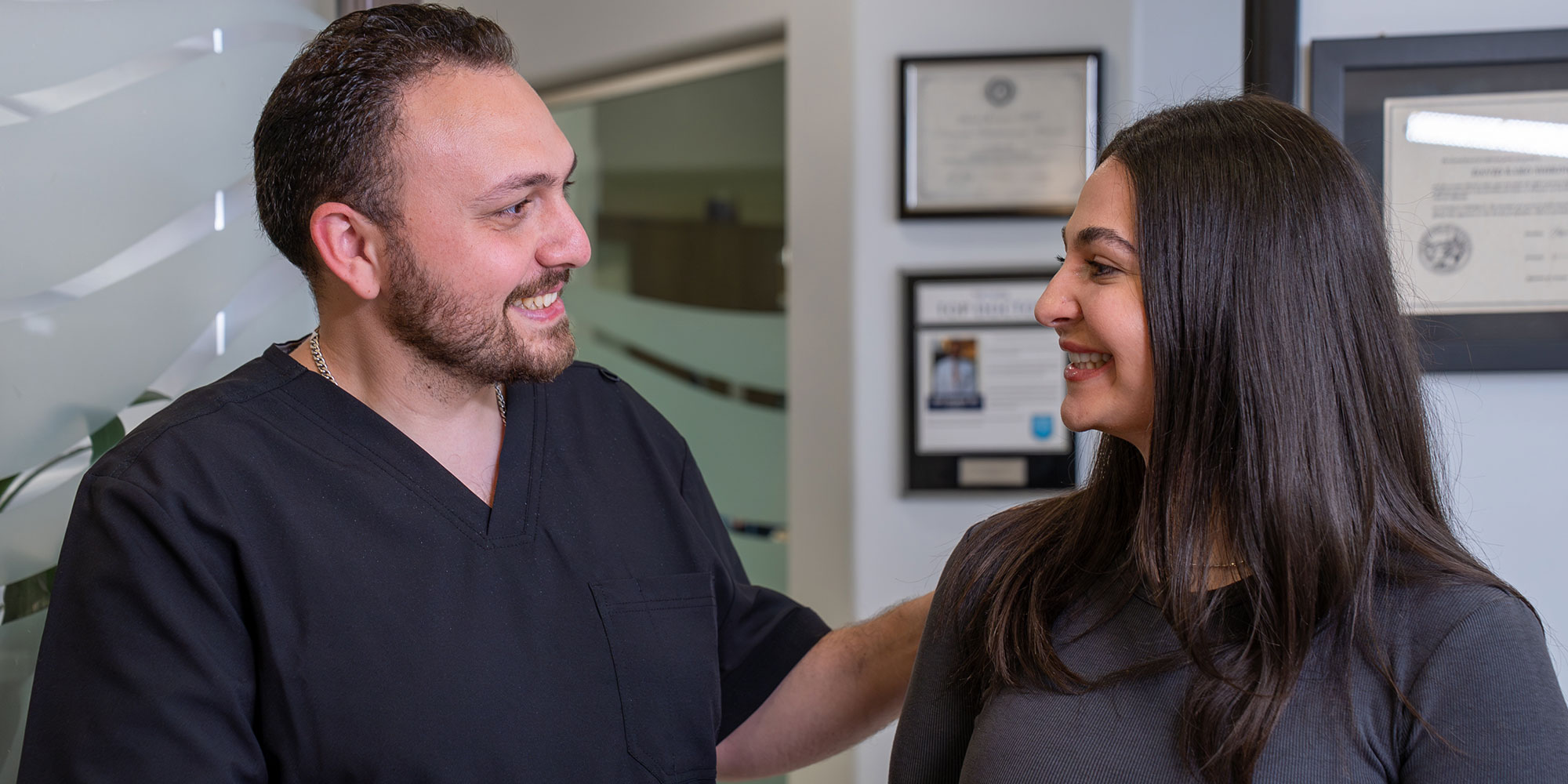 Doctor and patient smiling at each other